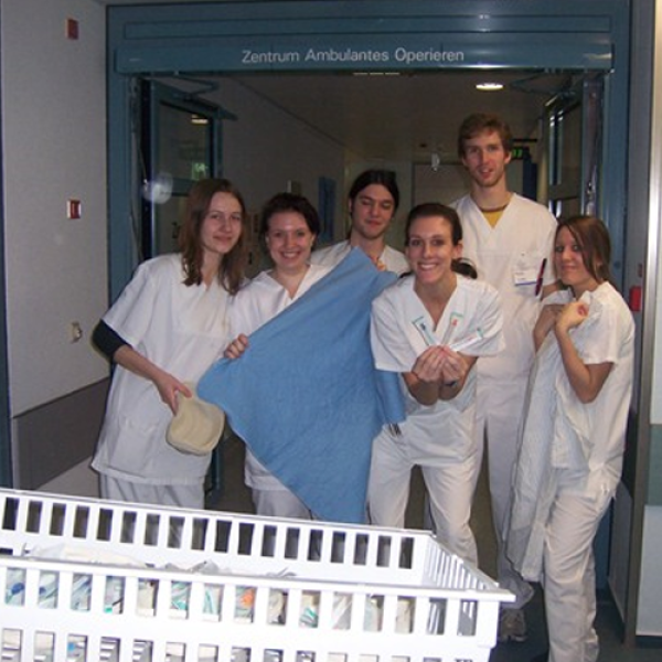 GLBL student with a group in a hospital