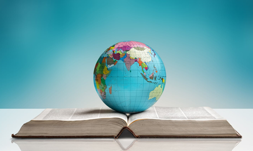 Globe resting on an open book