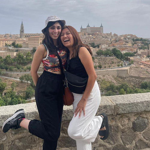 Two students overlooking a city in Spain